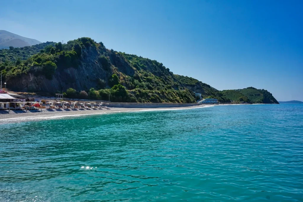 Turquoise water and white pebbles on the Albanian Riviera
