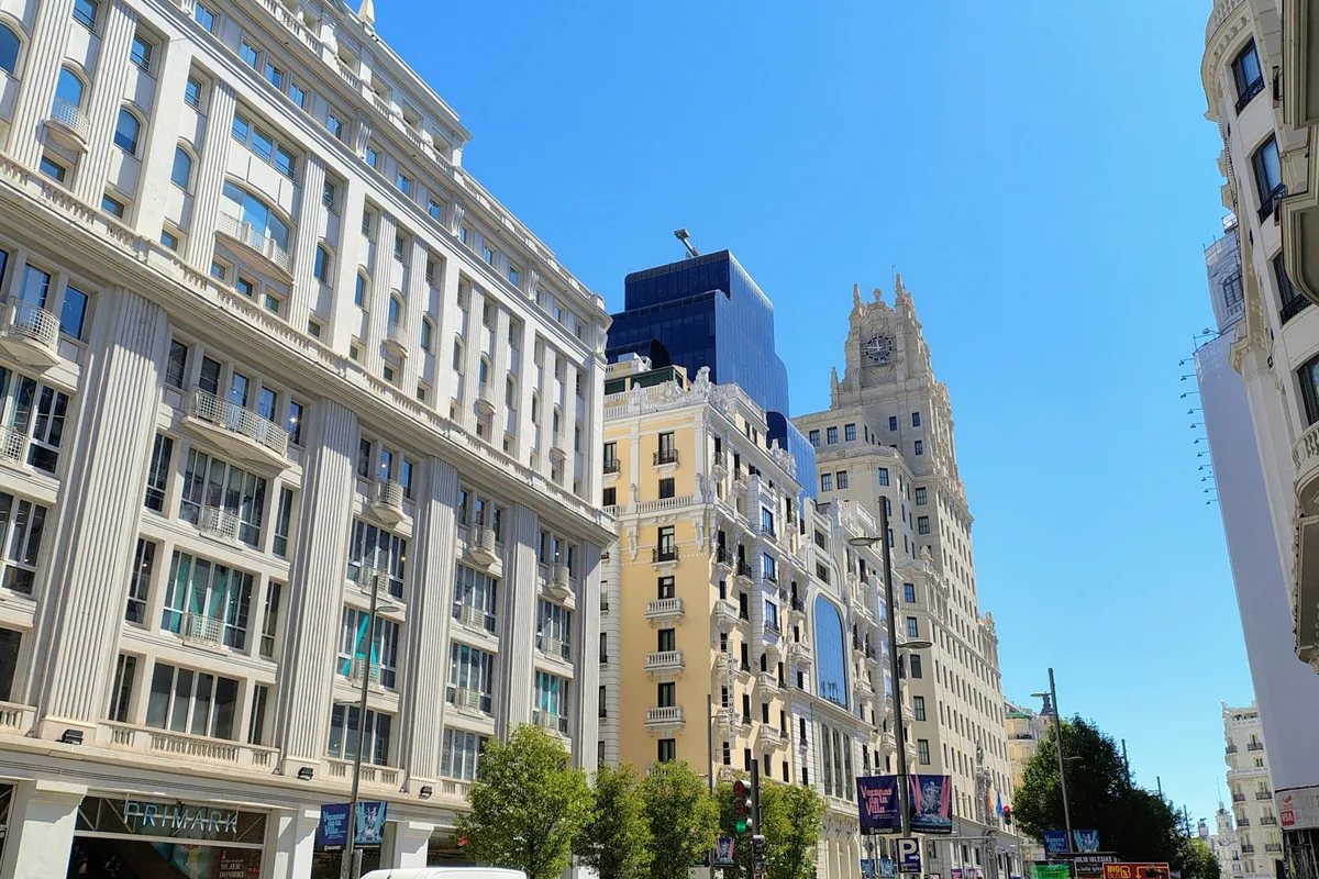 Historic buildings and the Telefónica tower on Gran Vía, the street where Museo Chicote has served cocktails since 1931