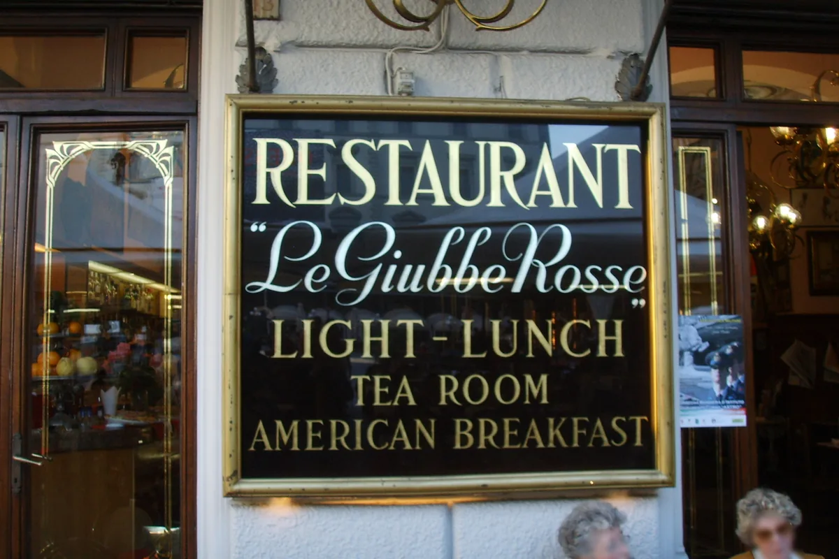 The Le Giubbe Rosse sign at the entrance of the cafe in Florence