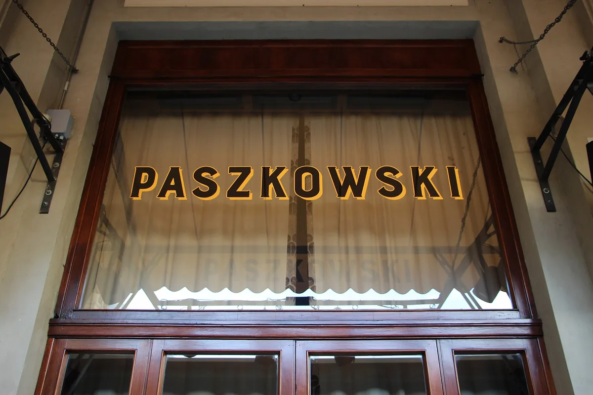 The gold Paszkowski sign above the entrance of Caffè Concerto Paszkowski in Florence