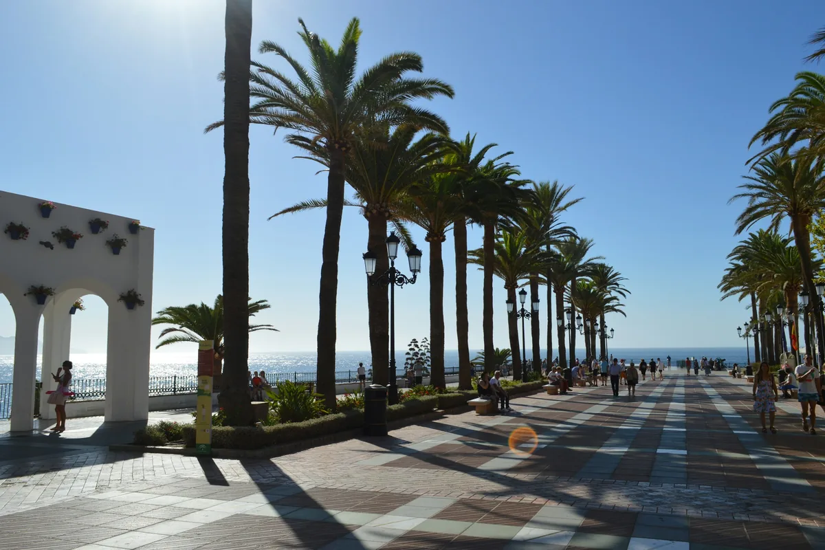 The palm-lined Balcón de Europa promenade in Nerja