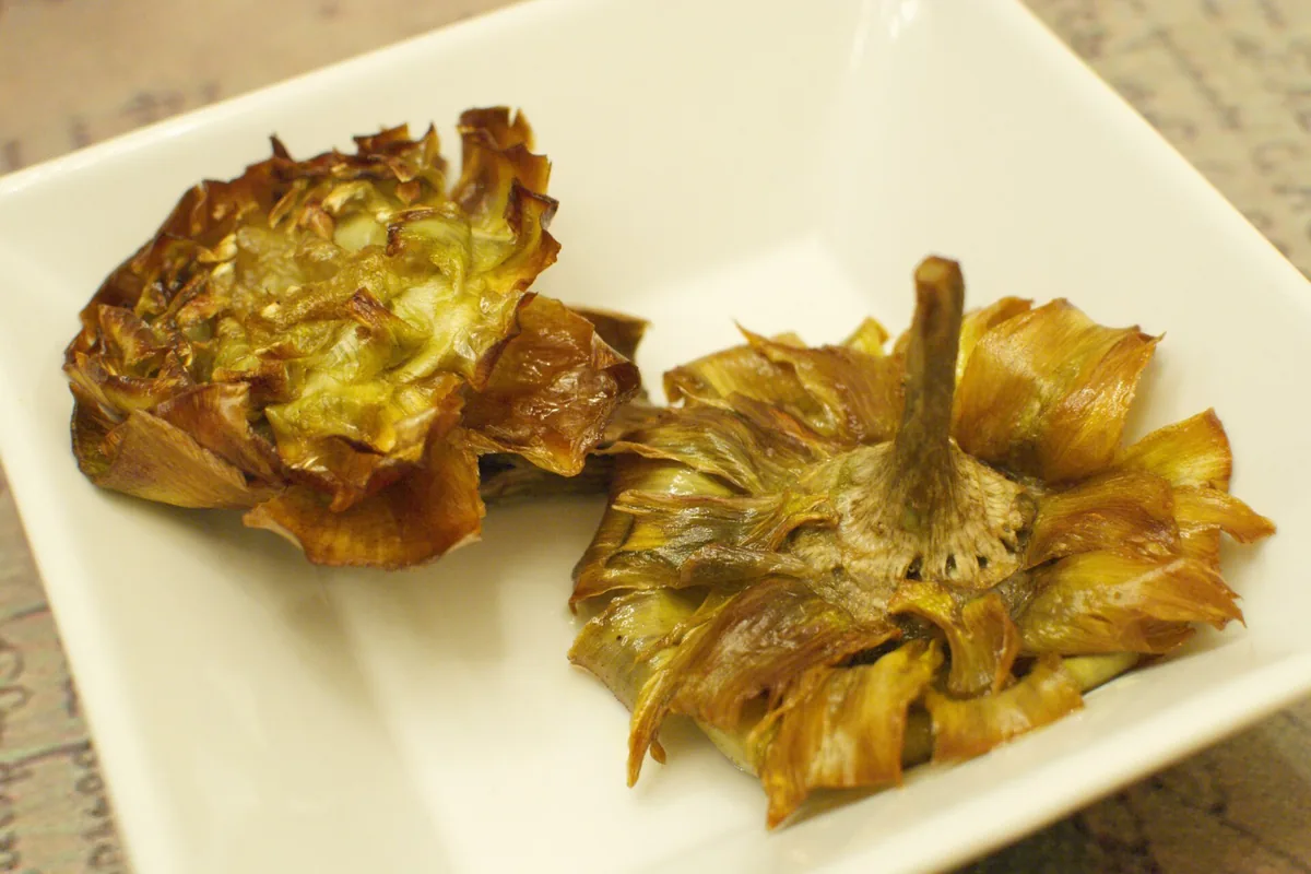 Two carciofi alla giudia, deep-fried artichokes, in Rome's Jewish Ghetto