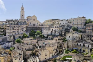 The Sassi di Matera in Basilicata, Italy, with the cathedral bell tower above the old stone houses