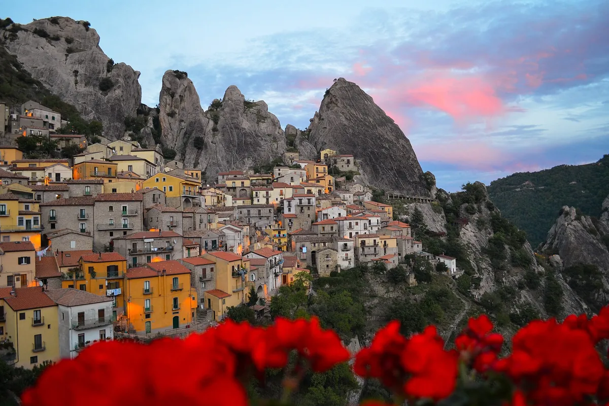 The stone houses of Castelmezzano below the peaks of the Lucanian Dolomites