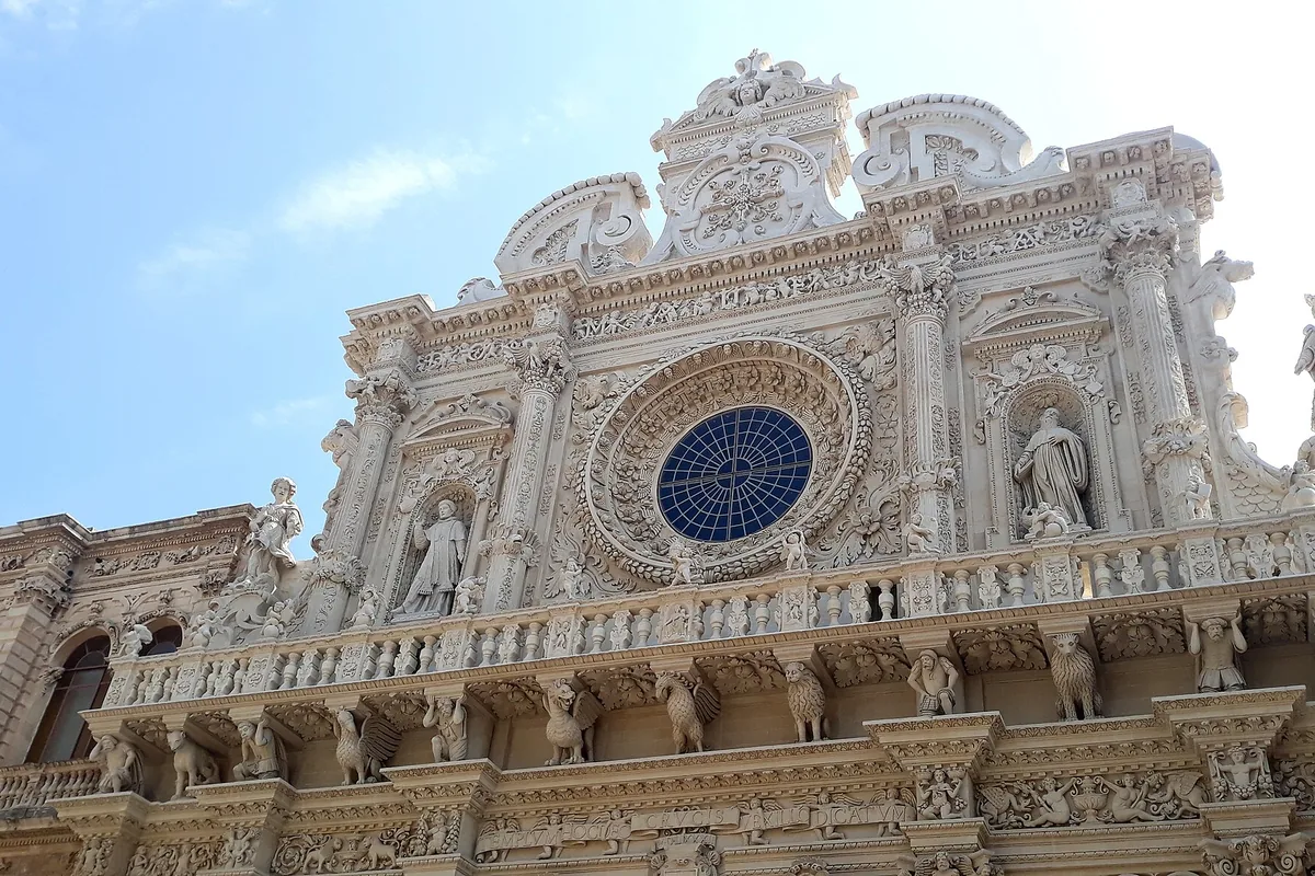 The carved baroque facade of the Basilica di Santa Croce in Lecce