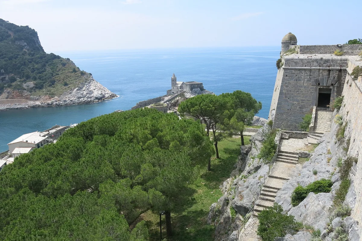 The Church of San Pietro on its rocky point above the sea at Portovenere, seen from Doria Castle