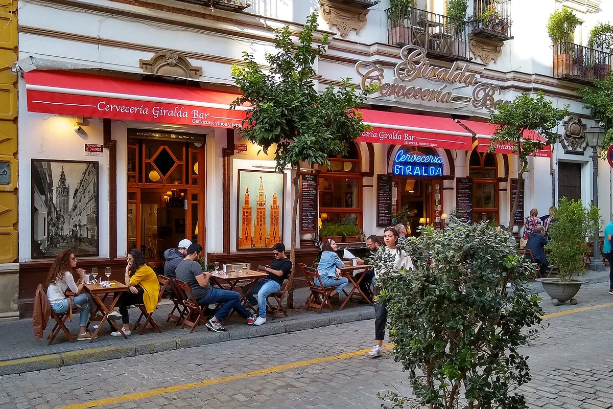 The street frontage and terrace of Bar Giralda in Seville