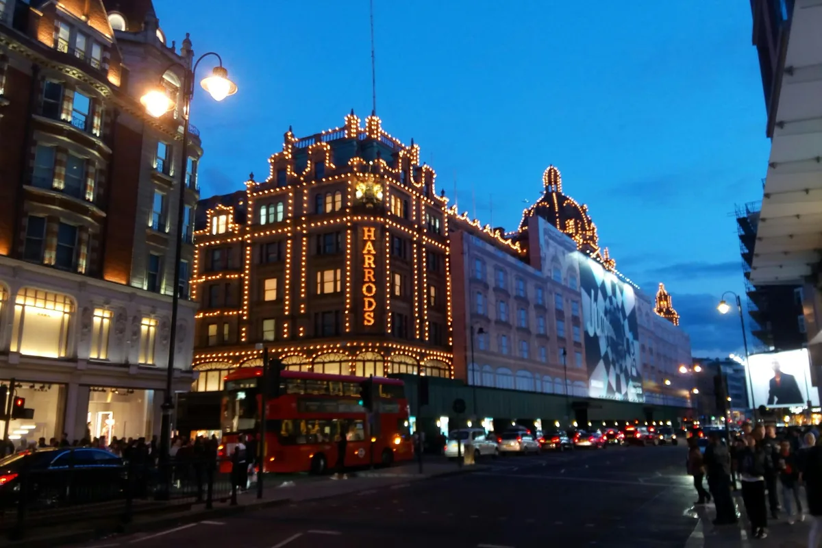 Harrods department store in Knightsbridge lit up at dusk