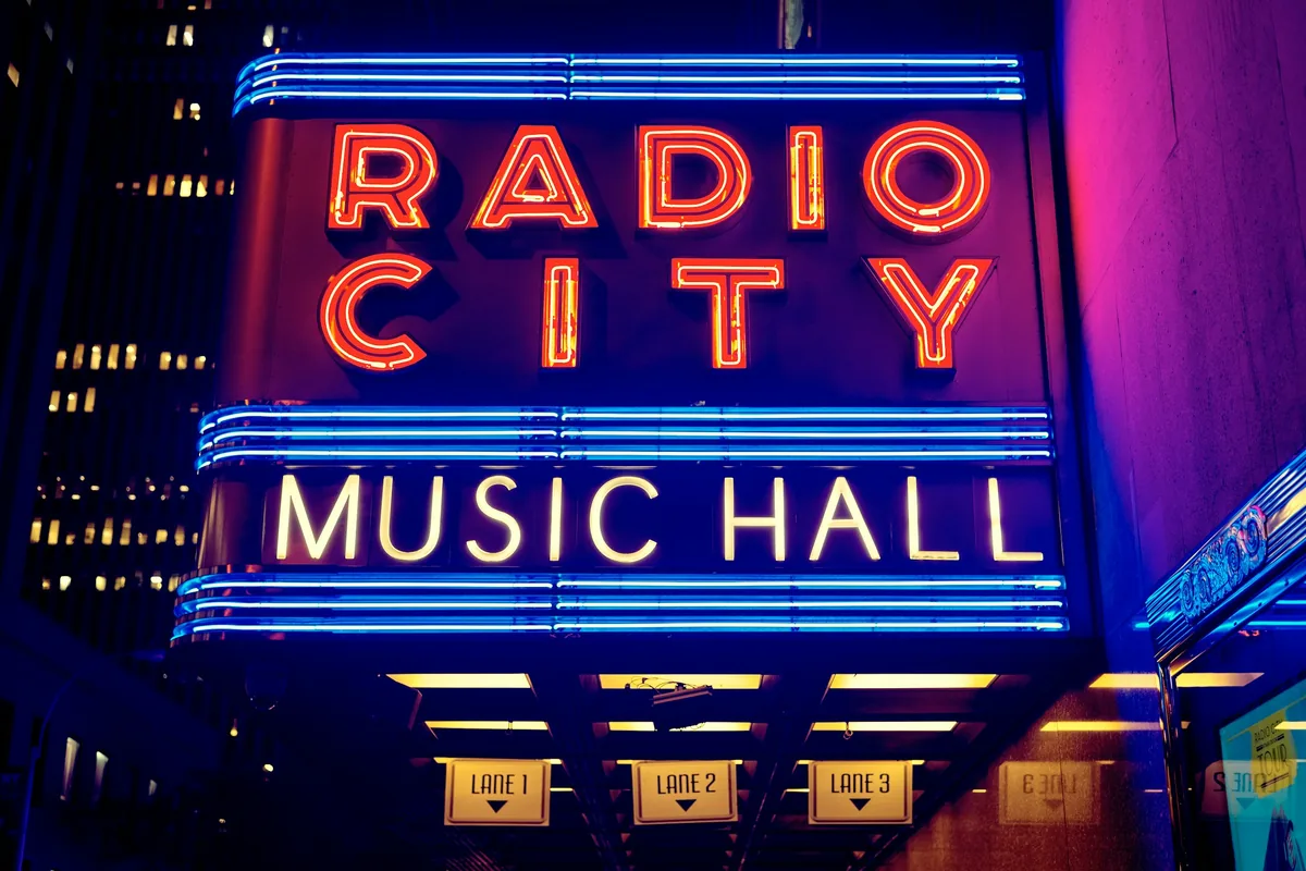 Neon sign of Radio City Music Hall at night in New York