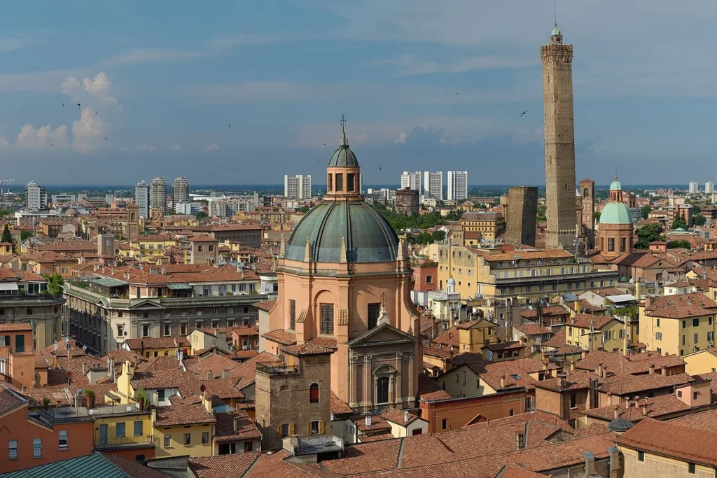 Red rooftops and medieval towers of Bologna, the base for day trips across Emilia-Romagna