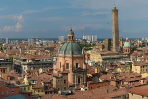 Red rooftops and medieval towers of Bologna, the base for day trips across Emilia-Romagna