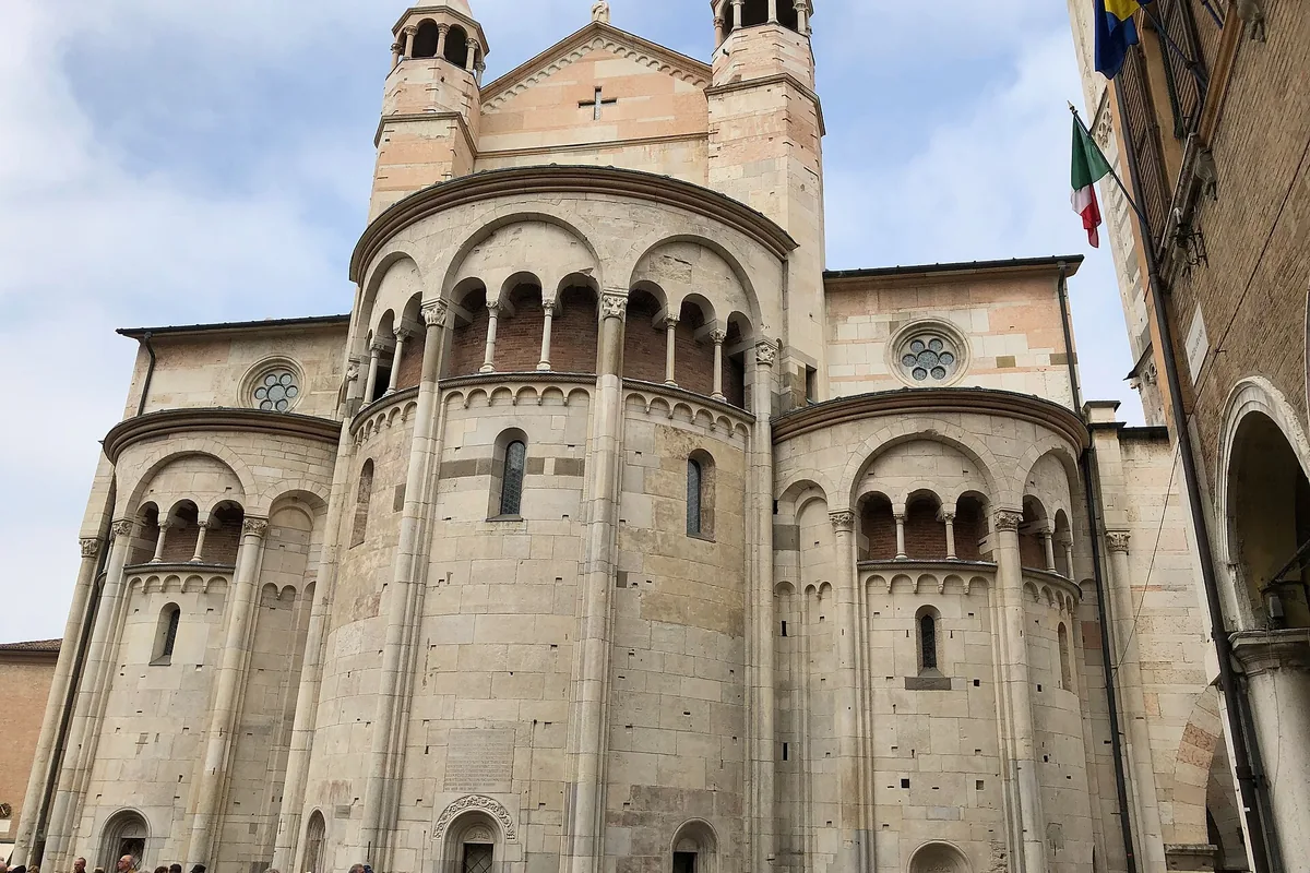 The Romanesque apse of Modena Cathedral seen from the lanes behind Piazza Grande