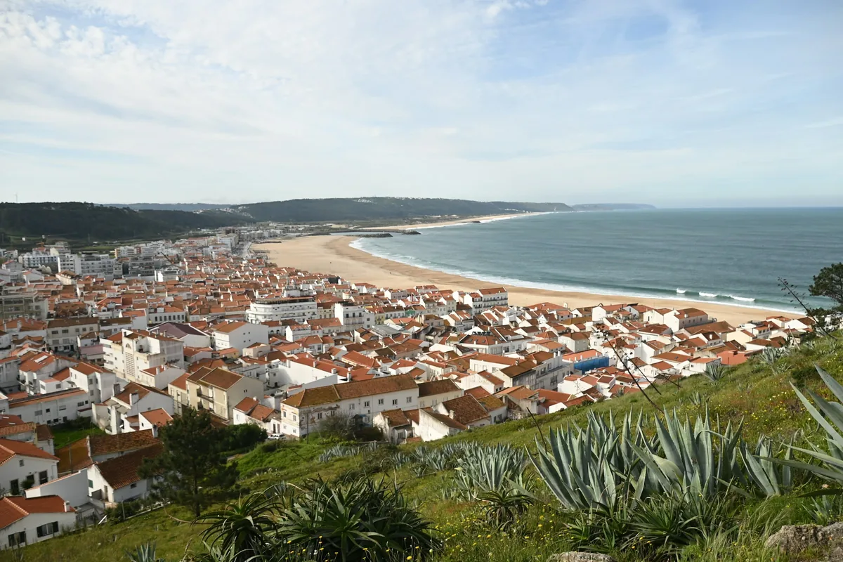 The beach and town of Nazaré seen from the clifftop, Portugal