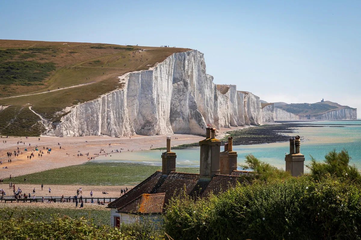 The Seven Sisters chalk cliffs and coastguard cottages on the Sussex coast