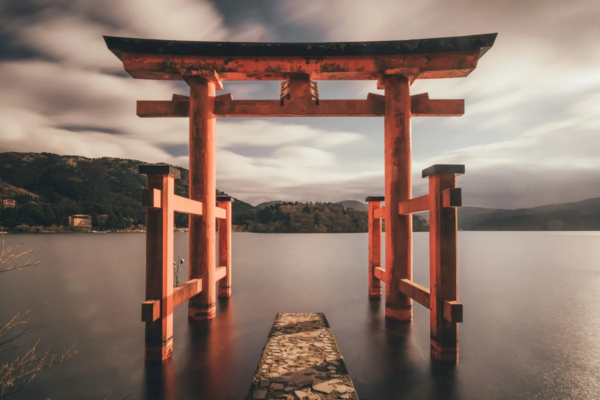 The red torii gate of Hakone Shrine on Lake Ashi