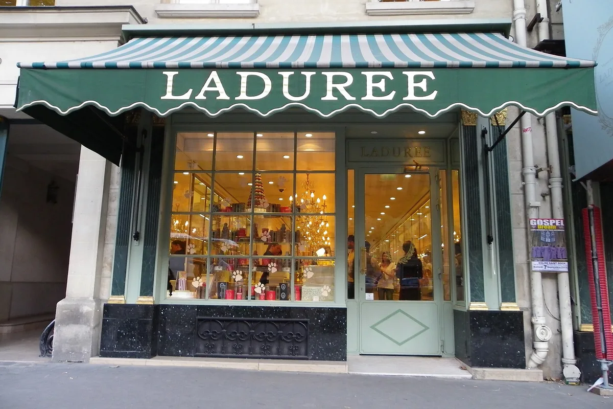 The Ladurée shopfront with its green awning on Rue Royale in Paris