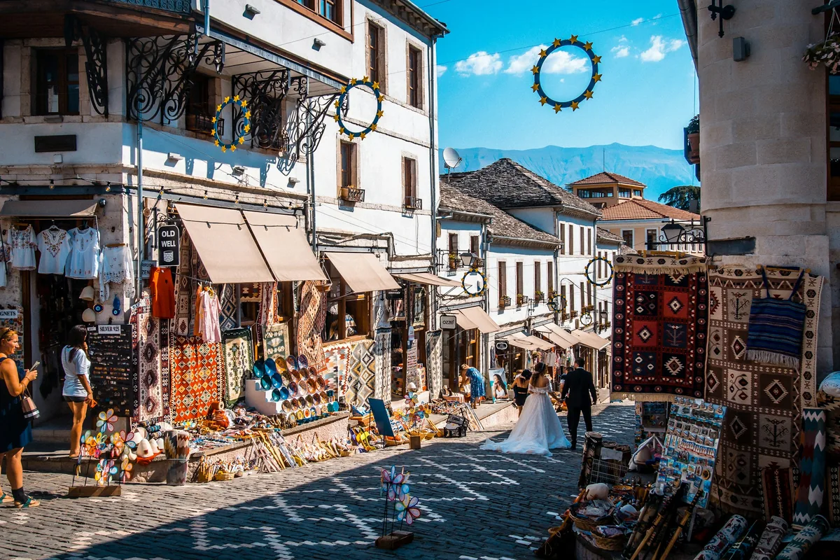 Stone-paved street and craft shops in the Old Bazaar of Gjirokastër