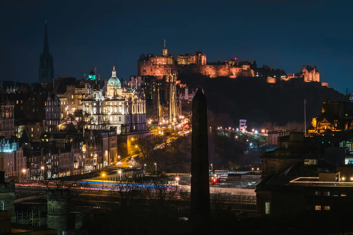 Edinburgh Castle and the Old Town skyline lit up at night