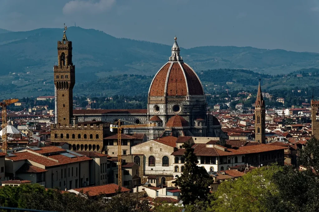 Florence rooftops with the Duomo and Palazzo Vecchio tower