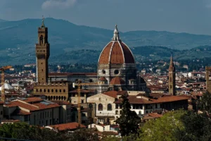 Florence rooftops with the Duomo and Palazzo Vecchio tower