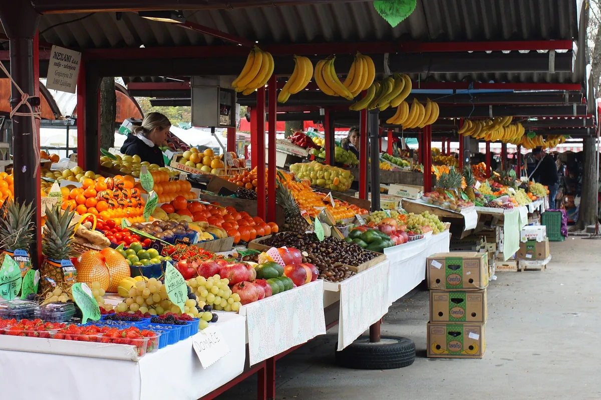 Fruit stalls under the canopy at the Central Market in Ljubljana