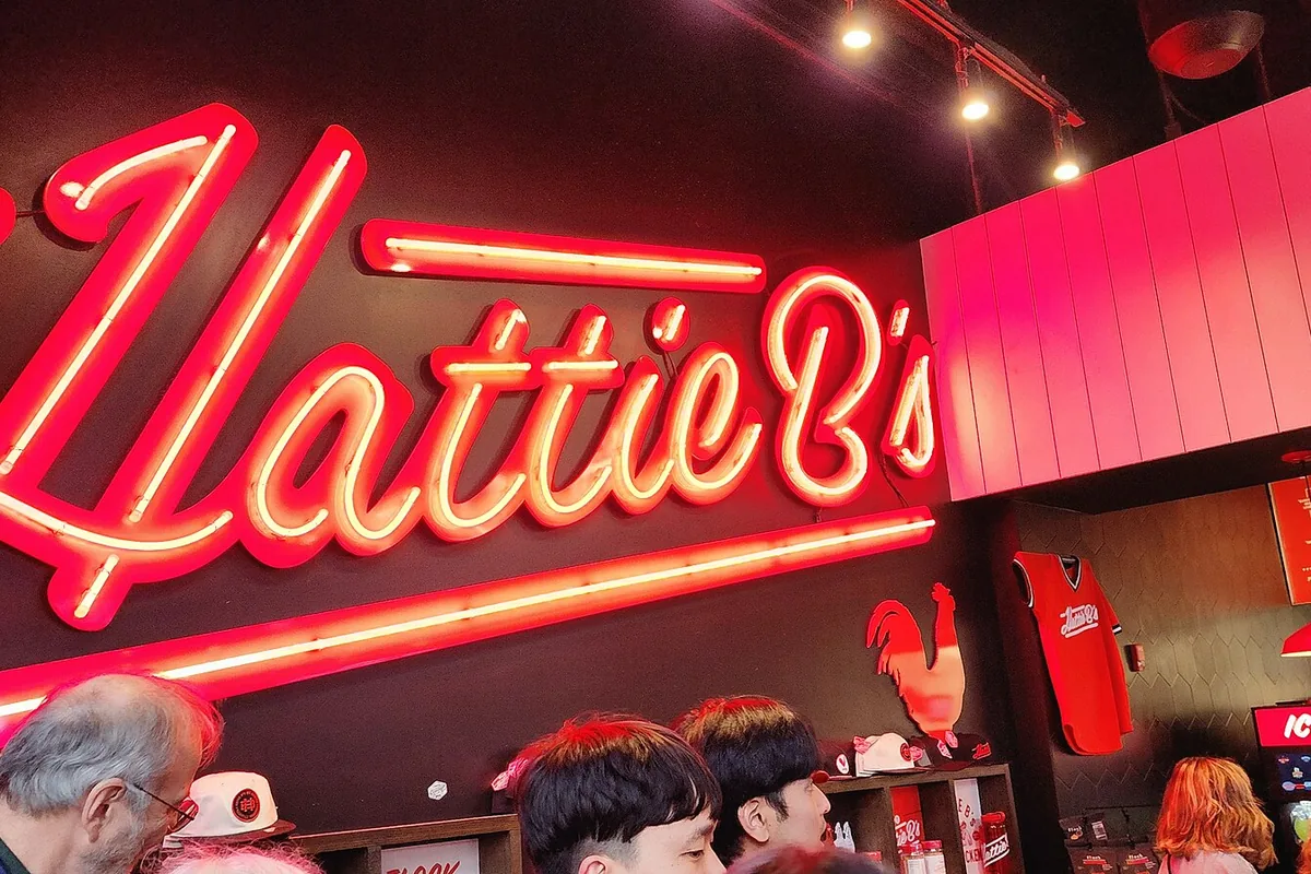 The neon Hattie B's sign inside the Hattie B's hot chicken restaurant in Nashville