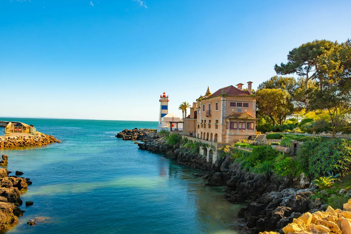 Santa Marta lighthouse and a seafront mansion in Cascais