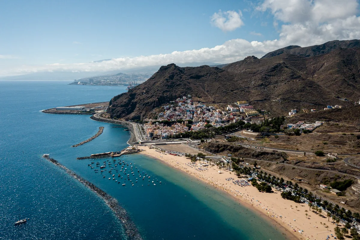 Golden sand of Las Teresitas beach below the hills of San Andrés, Tenerife